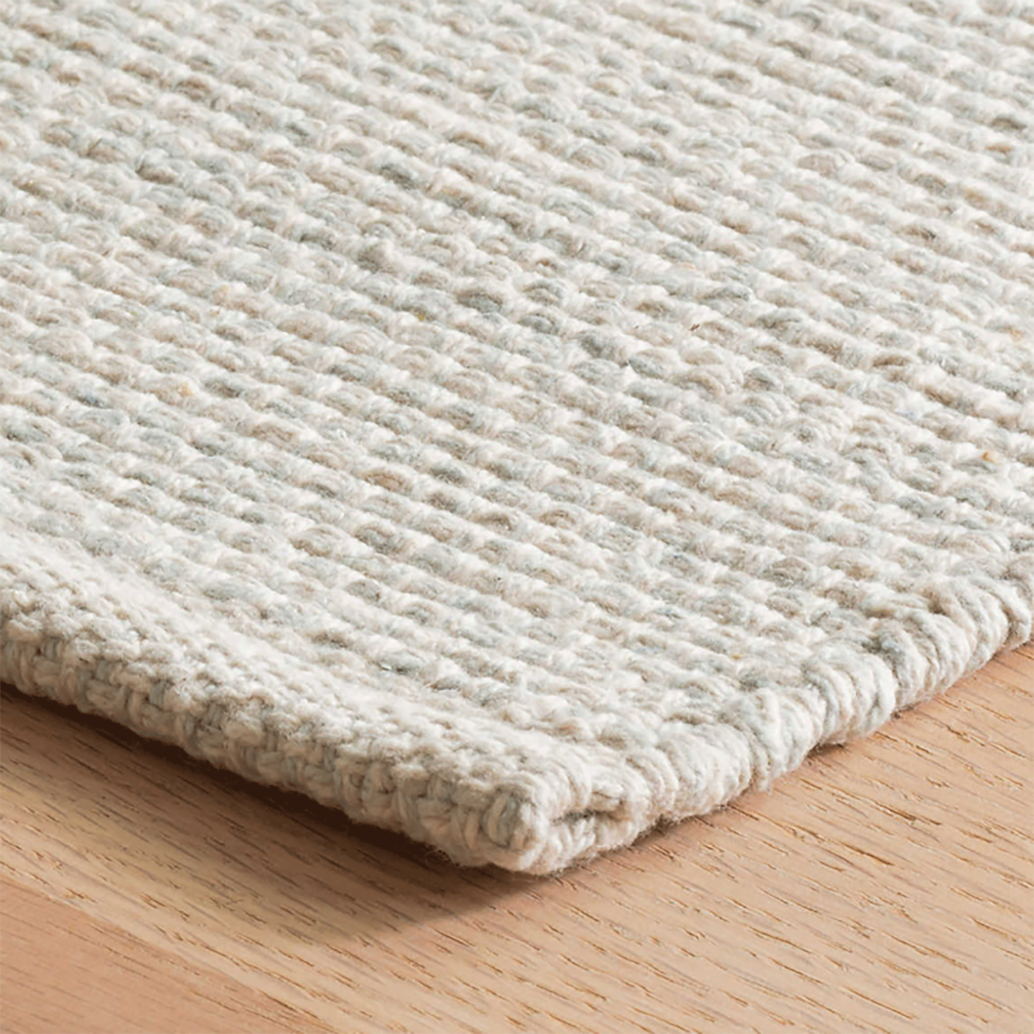 https://www.mainecottage.com/cdn/shop/products/marled-light-blue-woven-cotton-rug-corner_2048x.gif?v=1653582733